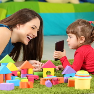 Talking toddler playing with mom