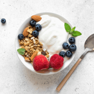 Calcium-rich yogurt bowl with almonds and berries